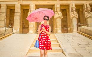 Girl in front of Queen Hatshepsut Temple - Egypt Tours - On The Go Tours