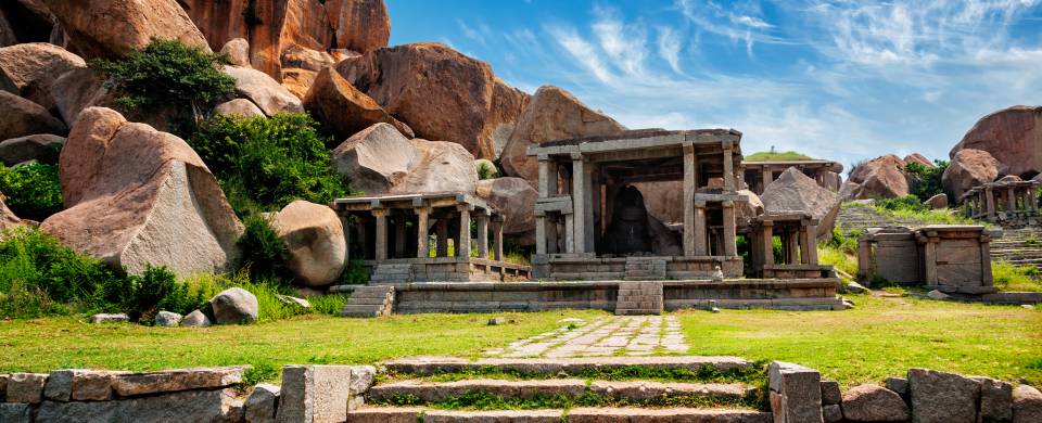 The ancient ruins, being reclaimed by nature, in Hampi