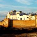 The walled city of Essaouira sitting on the edge of the water