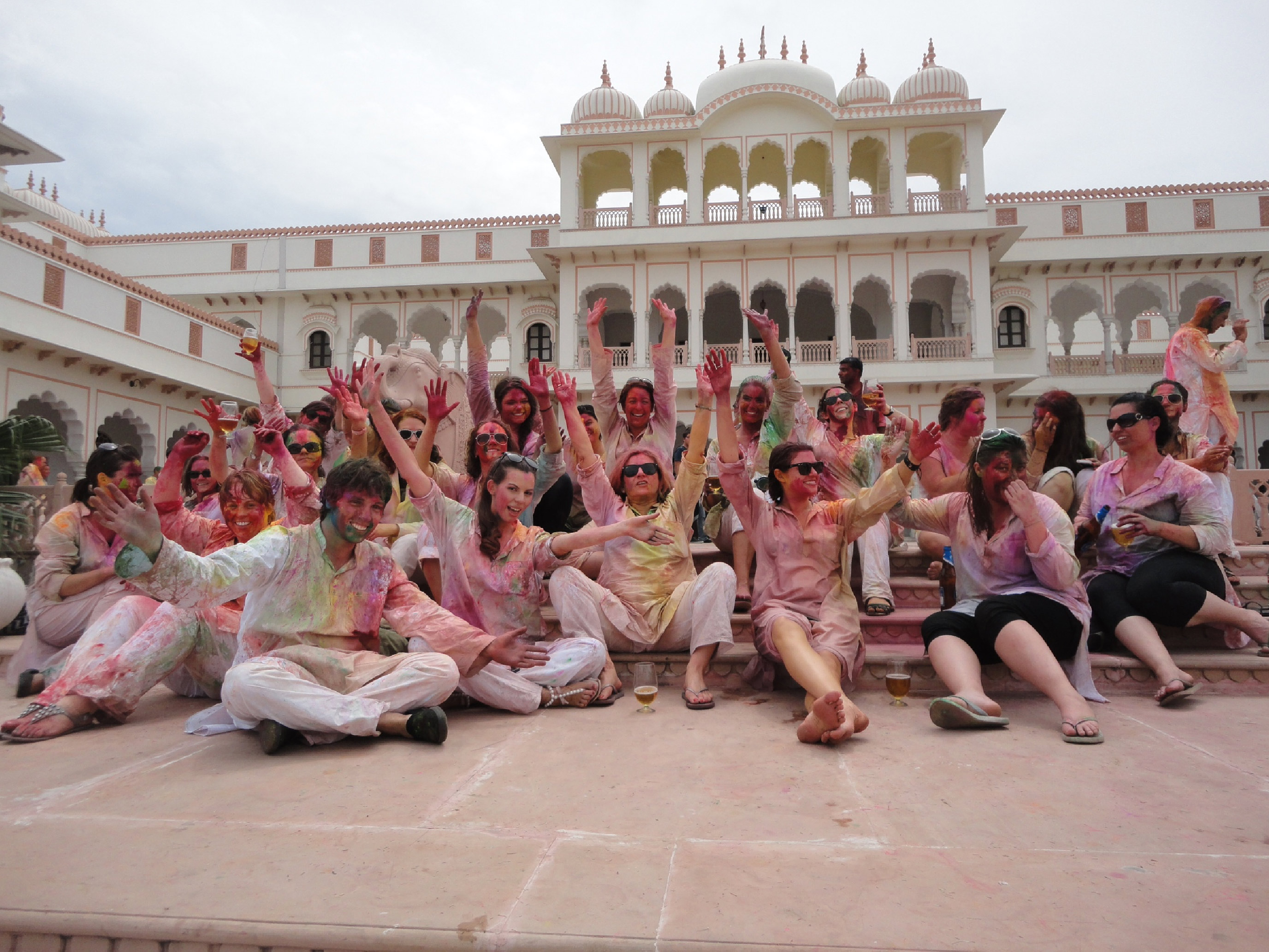 A tour group celebrating Holi