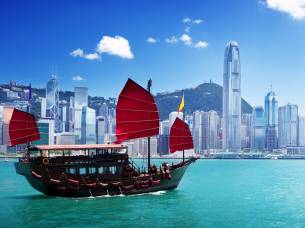 Hong Kong harbour with traditional Chinese sailing boat