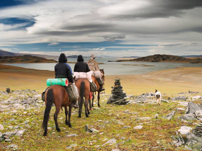 Horse riding in Mongolian wilderness