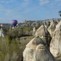 Hot air balloons floating over the stunning landscape of Cappadocia