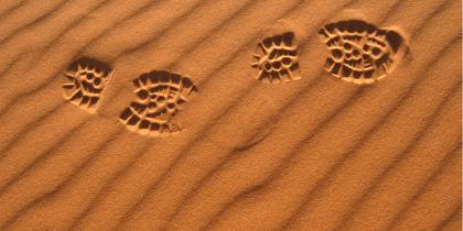 Human footprints in Saharan sand