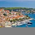 View of the main strip of Split, lined with palm trees along the waterfront