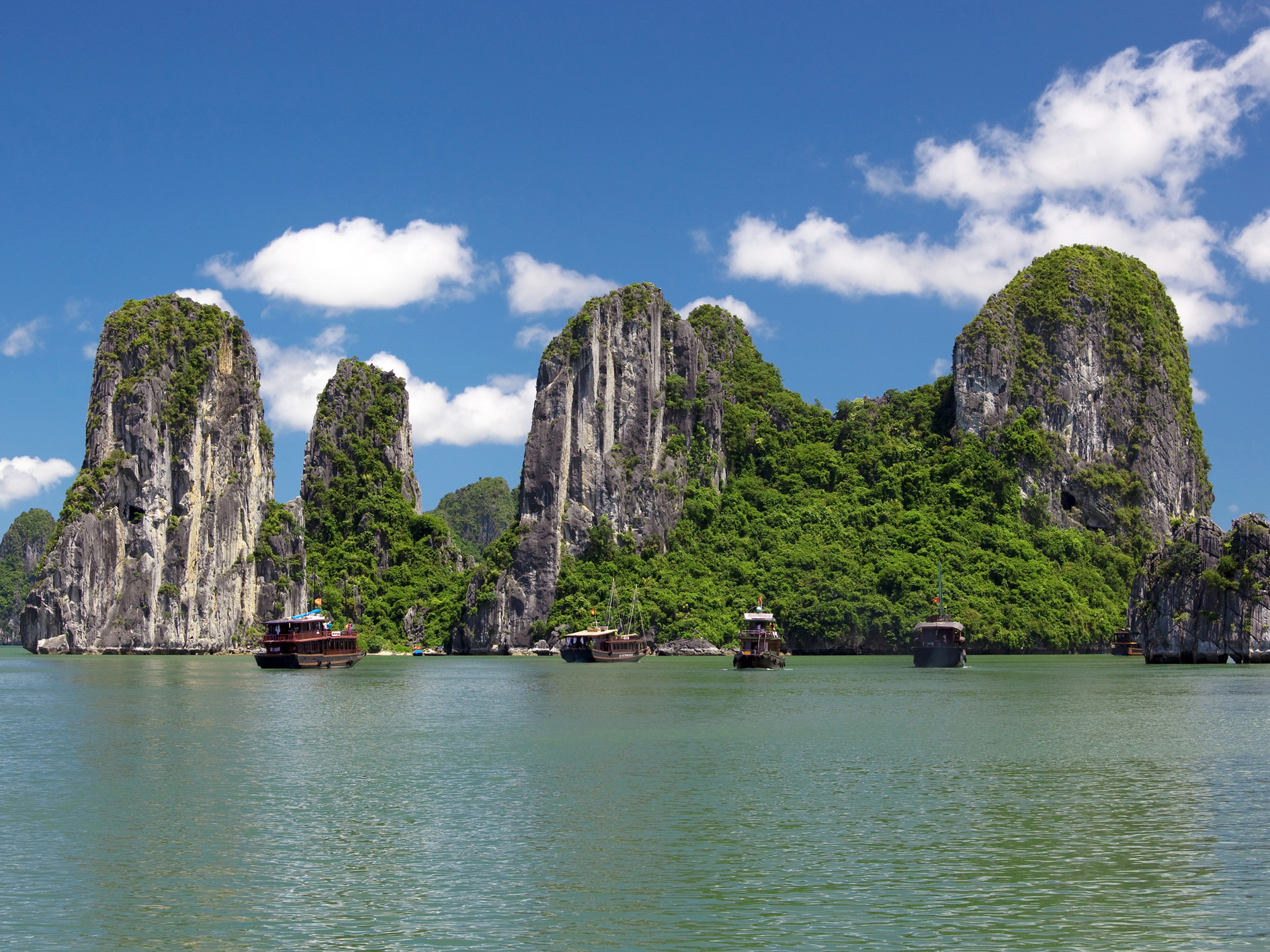 Junk boats cruising on Halong Bay