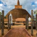 The setting sun behind a temple in Anuradhapura