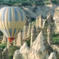 Hot air balloons floating over the stunning landscape of Cappadocia