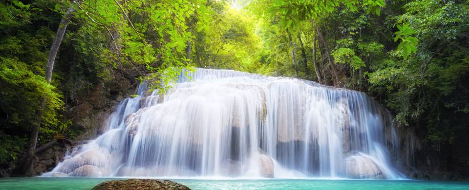 Picturesque waterfall in the middle of the jungle in Kanchanaburi