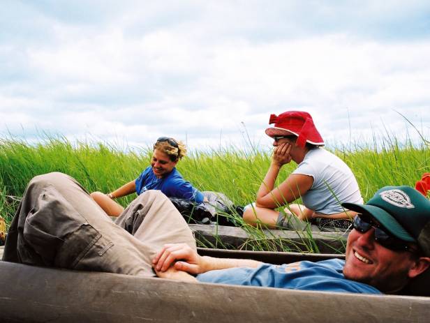 Mokoro boat gliding along the Okavango River