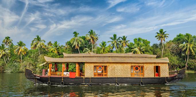 On the backwaters of Kerala in a traditional riceboat