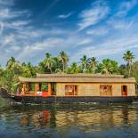 On the backwaters of Kerala in a traditional riceboat
