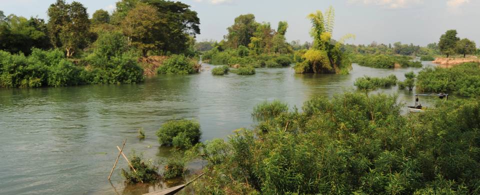 Water surrounded by lush vegetation on Khong Island