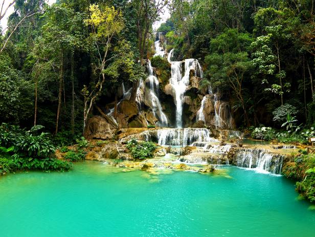 Stunning waterfall with aquamarine water in Luang Prabang