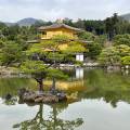 Beautiful lake with a temple in the background in springtime in Kyoto