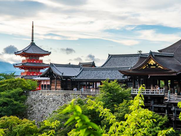 Beautiful lake with a temple in the background in springtime in Kyoto