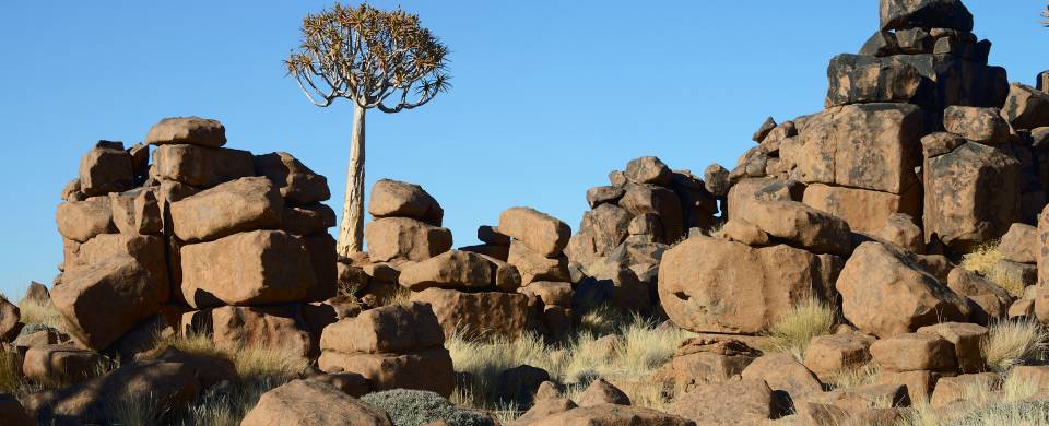 Devil's Playground rocks against a beautiful blue sky in Kleetmanshoop