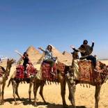 Ladies on camels at the Pyramids of Giza | Egypt | On The Go Tours