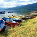 Colourful boats on the edge of the lake in Pokhara