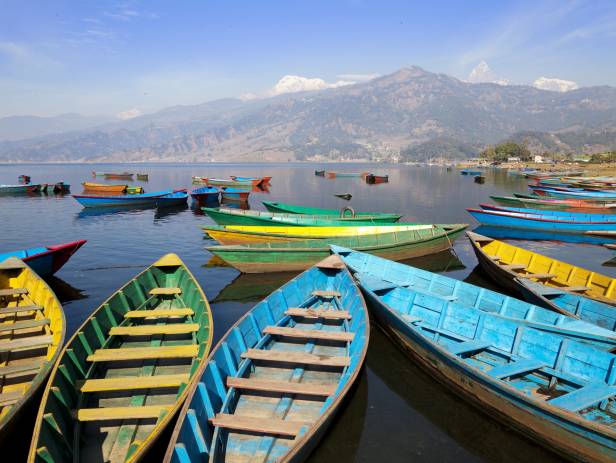 Colourful boats on the edge of the lake in Pokhara