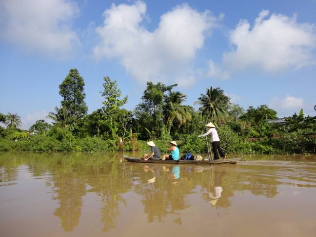 Boat making its way along the Mekong Delta near Can Tho