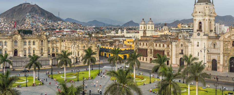 View across the Plaza Mayor in Lima with mountains in the background