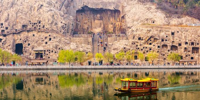 Longman Grotto by boat in Louyang | China