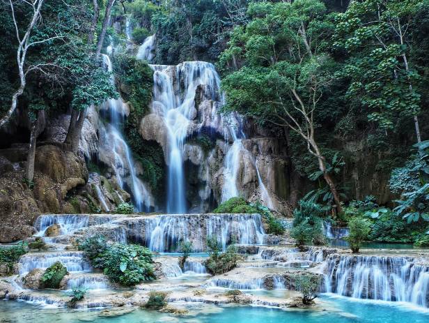 Stunning waterfall with aquamarine water in Luang Prabang