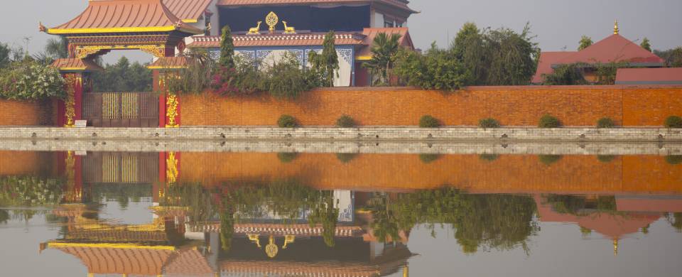 Reflection of a temple on the water in Lumbini