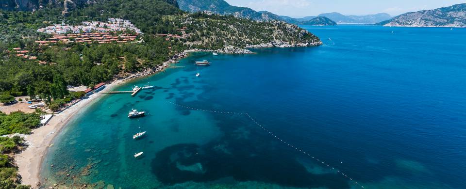 The arched bay and sparkling turquoise water of Marmaris