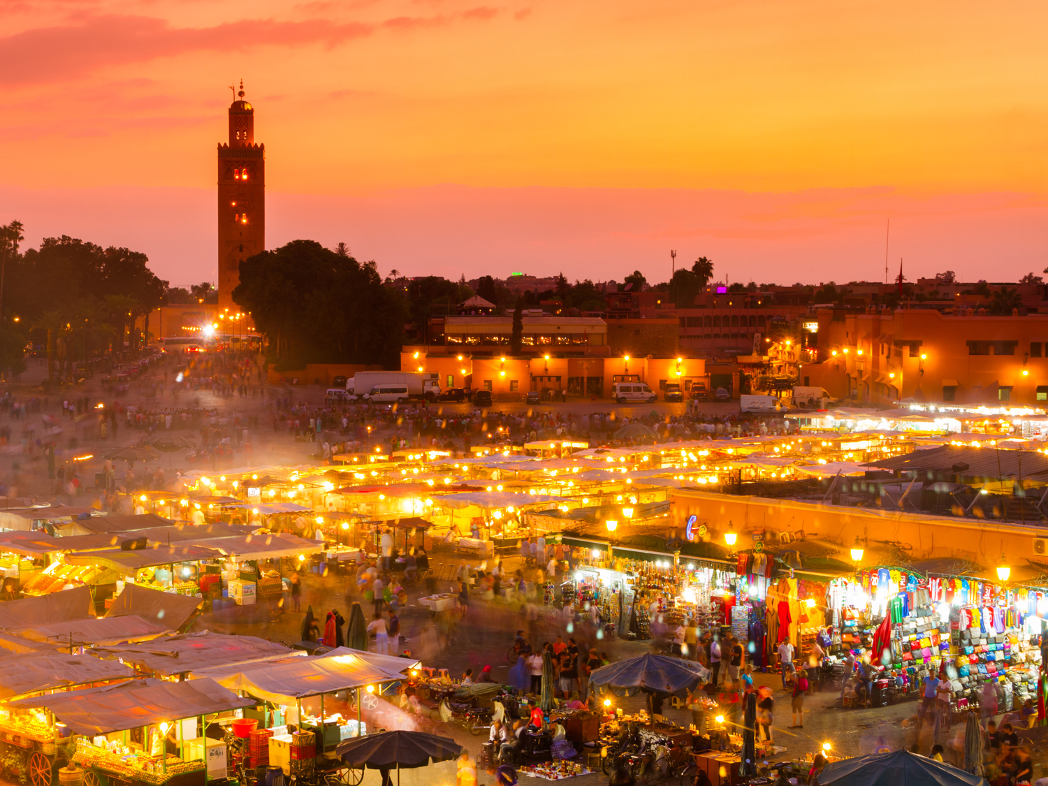 The sun begins to set over the twinkling lights of Djemaa el Fna | Marrakech | Morocco