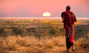 Masai Man watching sunset - Africa Overland Safaris - Africa Lodge Safaris - Africa Tours - On The G