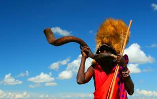 Masai Warrior in Kenya - Top Travel Tips - On The Go Tours