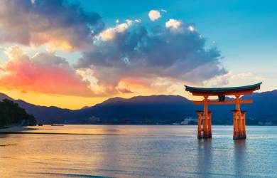 A beautiful sunset decorates the sky over Miyajima Island in Japan