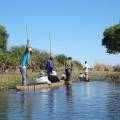 Mokoro boat gliding along the Okavango River