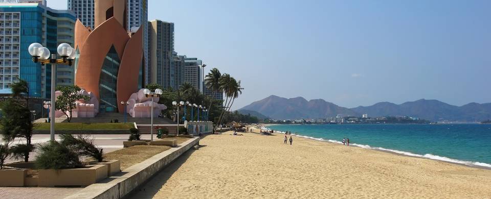 Cityscape lining the golden sand of the beach in Nha Trang