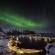 The Northern Lights dance over the Lofoten Islands in Norway