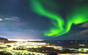 Northern Lights over Reykjavik in winter - Best time to visit Europe