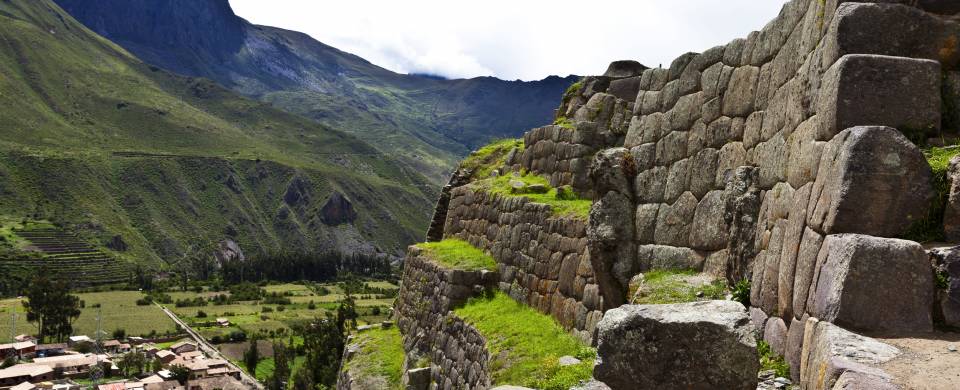 The ruins of Ollantaytambo nestled into the mountains of the Sacred Valley