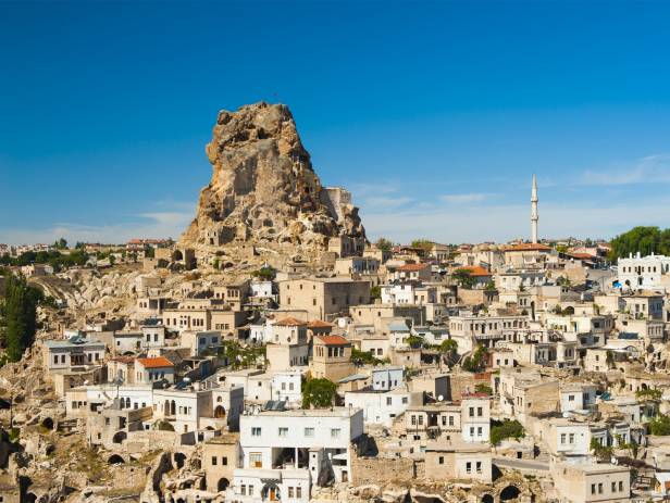 Hot air balloons floating over the stunning landscape of Cappadocia