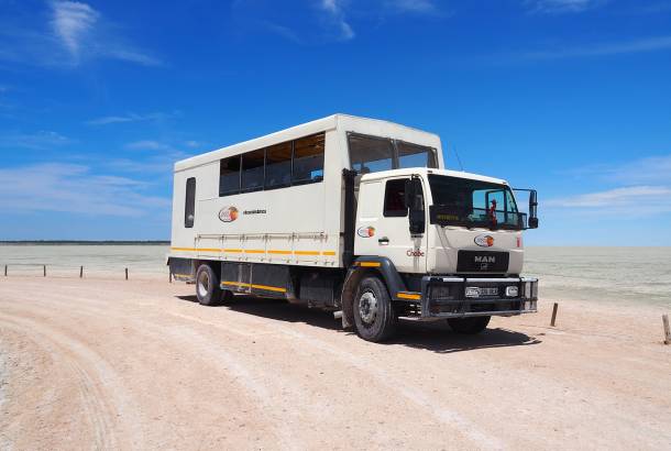 Overland truck at Etosha Pan in Namibia - Africa - On The Go Tours