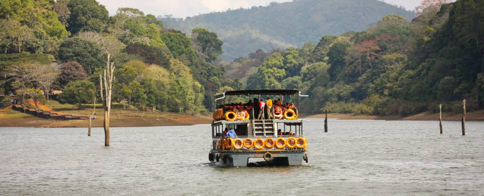Boat along the water at the Periyar Wildlife Sanctuary