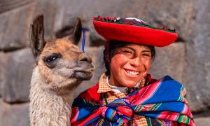 Peruvian lady and llama - Peru Tours - South America Tours - On The Go Tours