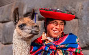 Peruvian lady and llama - Peru Tours - South America Tours - On The Go Tours