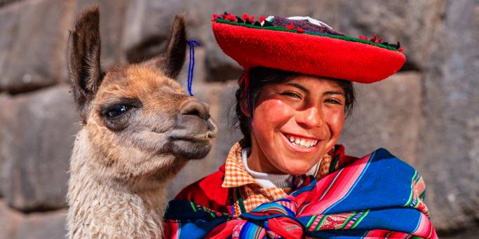 Peruvian lady and llama - Peru Tours - South America Tours - On The Go Tours