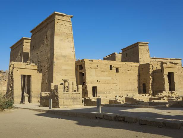 Ancient ruins standing majestically against the sky in Aswan