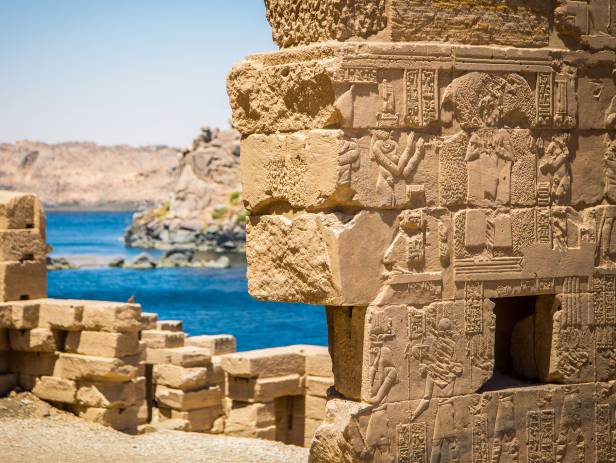 Ancient ruins standing majestically against the sky in Aswan