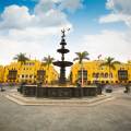 View across the Plaza Mayor in Lima with mountains in the background