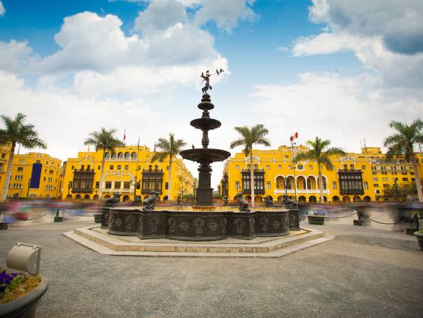 View across the Plaza Mayor in Lima with mountains in the background