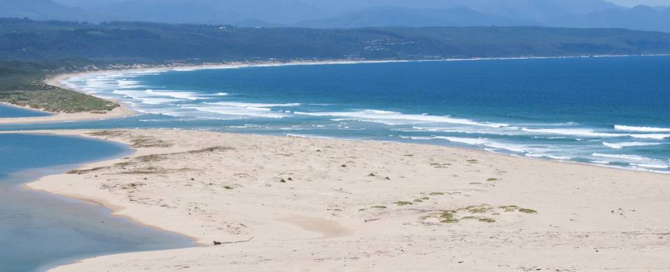 Dazzling blue lagoon and white sand in Plettenberg Bay